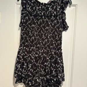 Black Floral Ruffle Romper by Truly Me